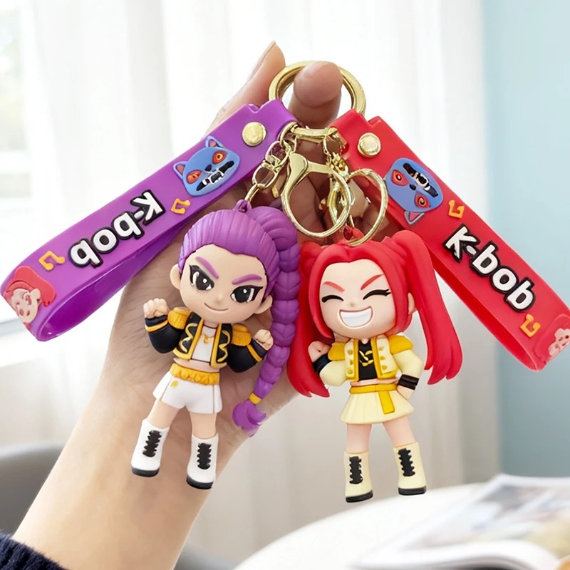 Actual Rumi and Mira keychains held together